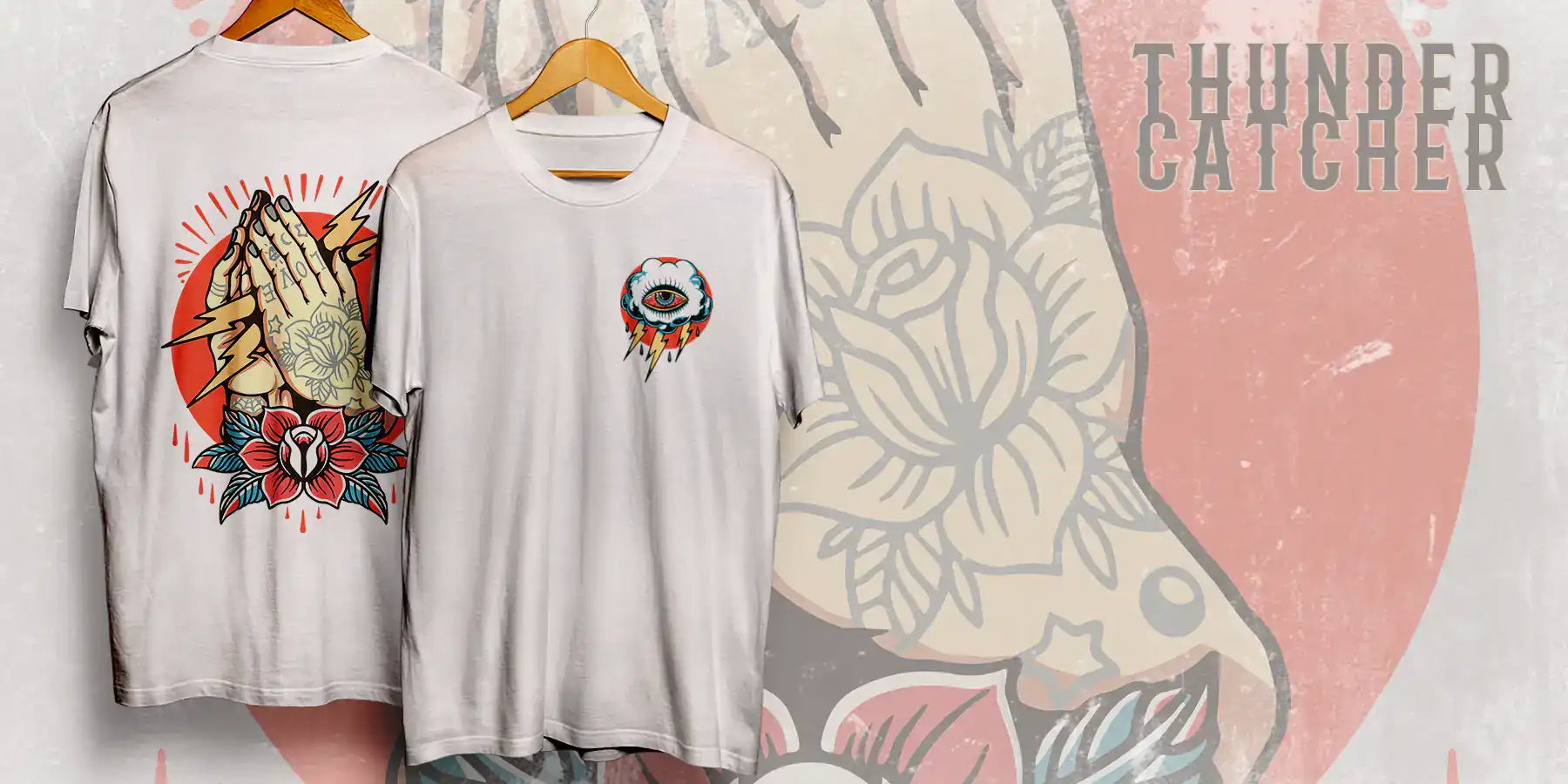 Tattoo style prints, Two vintage white t-shirts hanging, Eye cloud and thunderbolt, Back showing hands praying, Flower, lightning bolts and flash