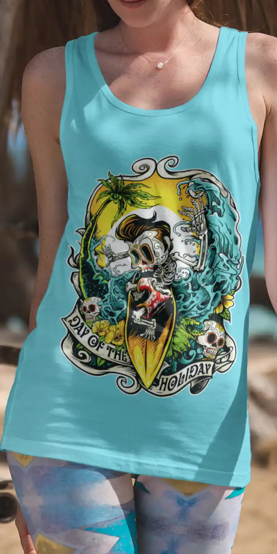 Woman is wearing a printed teal colour tank top. The tank top design is a skeleton riding a surfboard. Sea, sand and palms on the background - Mobile