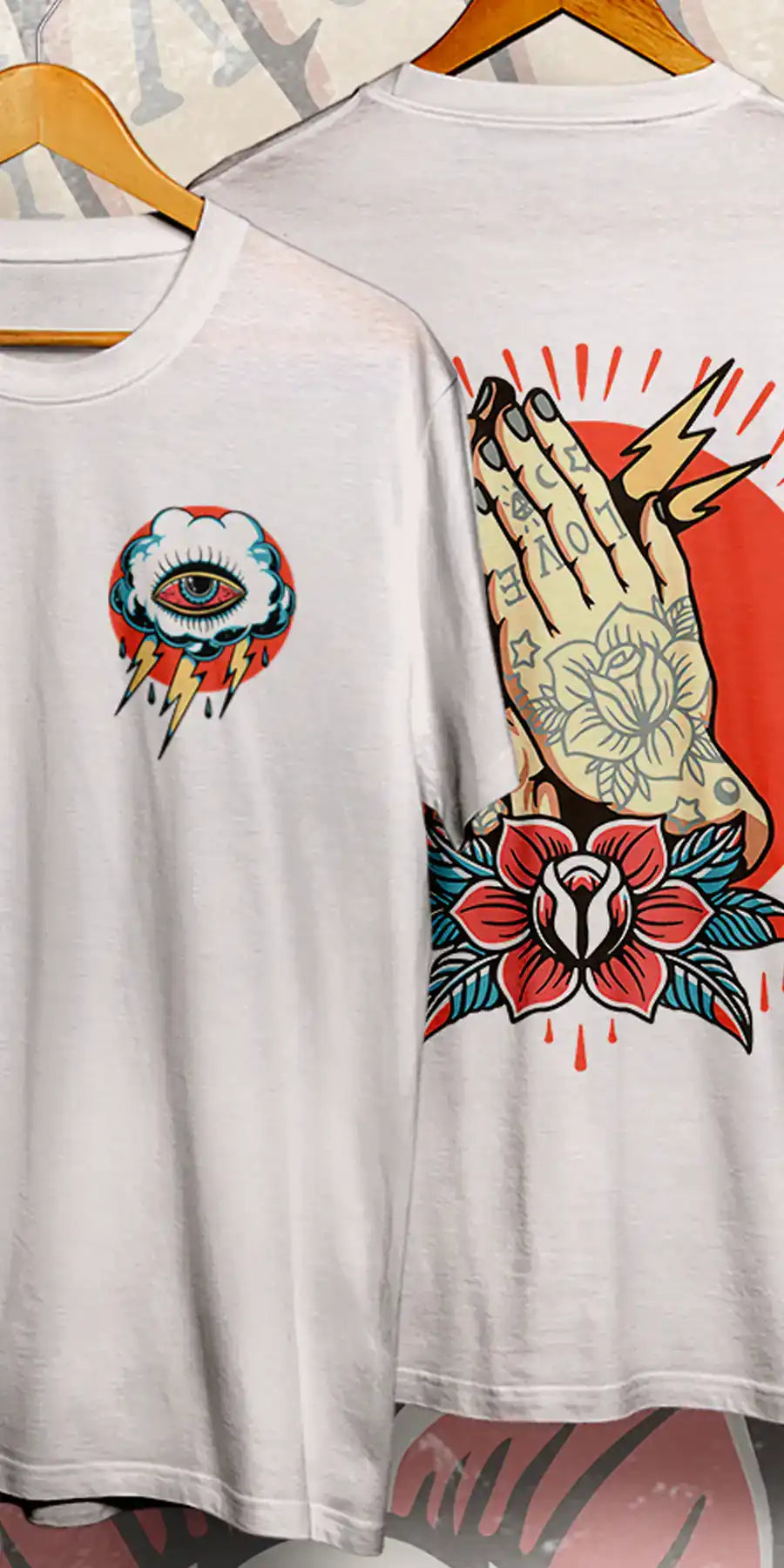 Tattoo style prints, Two vintage white t-shirts hanging, Eye cloud and thunderbolt, Back showing hands praying, Flower, lightning bolts and flash - mobile